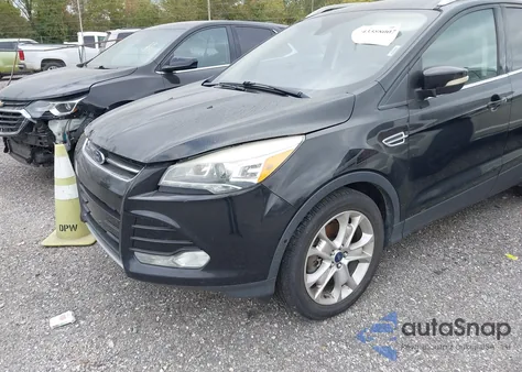 2016 Ford Escape Titanium из США, поврежденный, VIN 1FMCU9JXXGUB70074